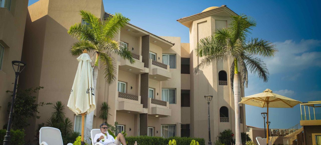 Relax in our Resort Family Suite with Swimmable Lagoon View, featuring full amenities for families and friends.