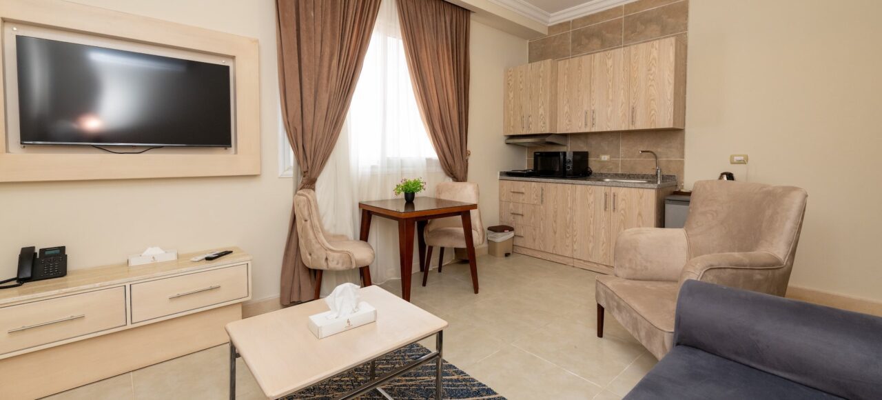 Explore the luxurious Aqua Pool Suite with private living, featuring elegant design and comfort at Marom Port Said Resort.