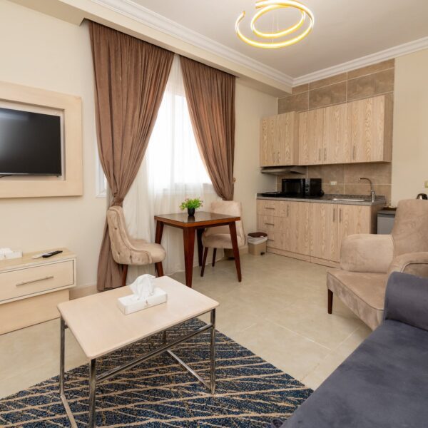 Explore the luxurious Aqua Pool Suite with private living, featuring elegant design and comfort at Marom Port Said Resort.