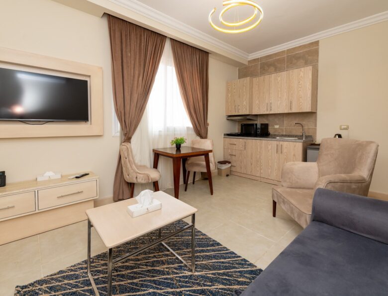 Explore the luxurious Aqua Pool Suite with private living, featuring elegant design and comfort at Marom Port Said Resort.